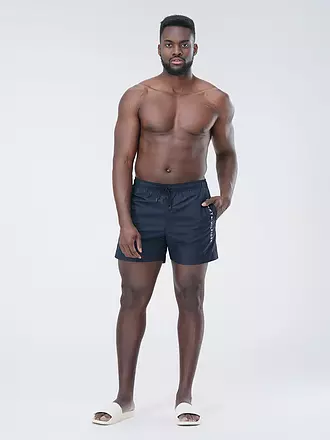 TOMMY HILFIGER | Badeshorts | grün