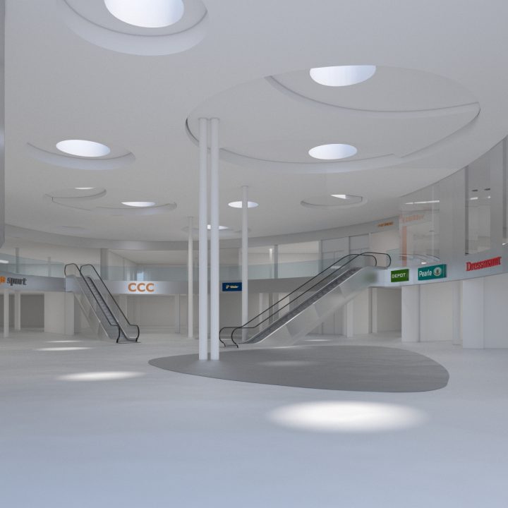 Ein geräumiges, modernes Einkaufszentrum mit gewölbter Decke und runden Oberlichtern. Rolltreppen führen in die obere Etage, wo verschiedene Ladenschilder zu sehen sind, darunter CCC und Cocoon. Der Boden ist glatt und hell.