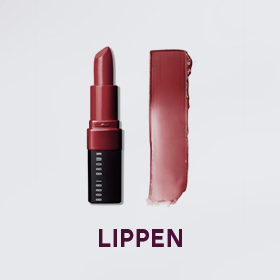 Vor einem hellgrauen Hintergrund ist ein roter Lippenstift mit einem Farbmuster der gleichen Farbe zu sehen. Unter dem Bild steht in fettem, dunkelrotem Text das Wort „LIPPEN“.