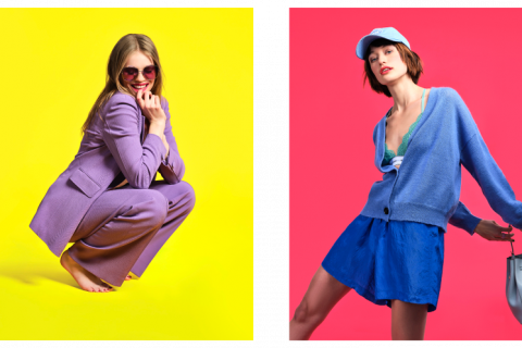 Zwei Frauen in stylischen Outfits vor hellem Hintergrund. Links: Frau in lilafarbenem Anzug und Sonnenbrille vor gelbem Hintergrund. Rechts: Frau in blauem Pullover, Shorts und Mütze vor rosa Hintergrund, hält eine Handtasche.