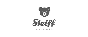 Logo von Steiff, mit einem stilisierten Teddybärgesicht über dem Markennamen in Schreibschrift, darunter steht „Since 1880“. Das Bild hat ein einfaches graues Farbschema auf weißem Hintergrund.