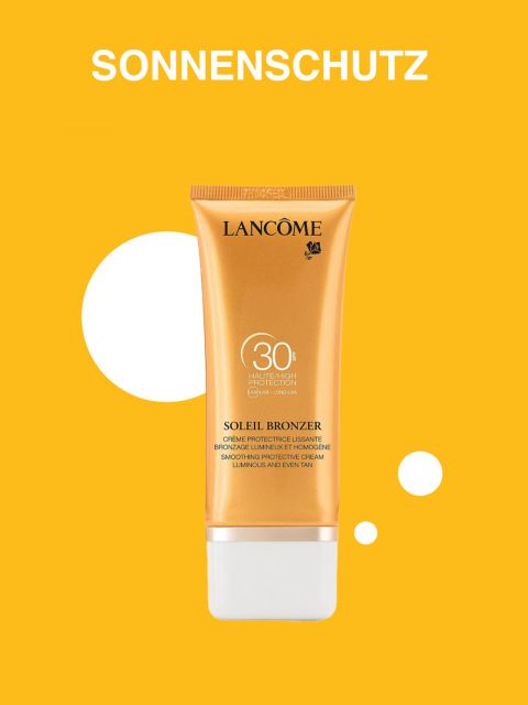 Eine gelbe Tube Sonnenschutzmittel Lancôme Soleil Bronzer SPF 30 ist vor einem leuchtend gelben Hintergrund mit weißen Kreisen zu sehen. Oben steht das Wort „Sonnenschutz“.