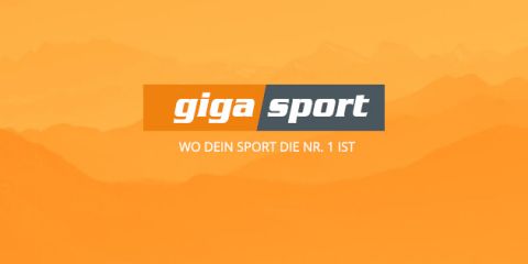 Logo von Gigasport mit dem Text „WO DEIN SPORT DIE NR. 1 IST“ vor einem orangefarbenen Hintergrund mit Farbverlauf und schwachen Bergumrissen.