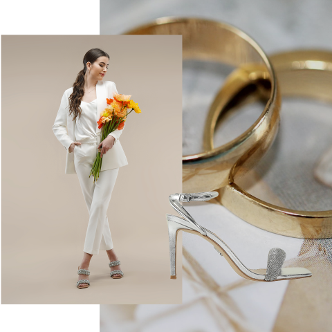 Eine Frau in einem weißen Anzug mit orangefarbenen Blumen steht vor einem Hintergrund aus goldenen Ringen und einem silbernen Stöckelschuh. Das Bild vermischt Mode- und Hochzeitsthemen.