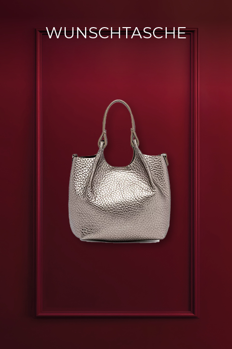 Eine strukturierte Handtasche aus Metall mit Griffen vor einem burgunderfarbenen Hintergrund. Darüber steht das Wort „WUNSCHTASCHE“.