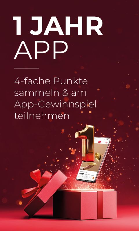 Rote Geschenkschachtel mit Schleife, geöffnet, aus der ein Smartphone und die goldene Zahl 1 herausragen, umgeben von Glitzern; deutscher Text über App-Belohnungen.