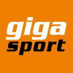 Das Bild zeigt das „Giga Sport“-Logo mit „Giga“ in fettem weißen Text und „Sport“ in fettem schwarzen Text. Der Hintergrund ist orange.