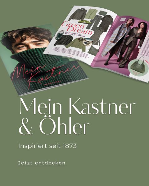 Ein grüner Hintergrund mit zwei aufgeschlagenen Modemagazinen, die Kleidung und Models zeigen. Der Text lautet: "Mein Kastner & Öhler. Inspiriert seit 1873. Jetzt entdecken.
