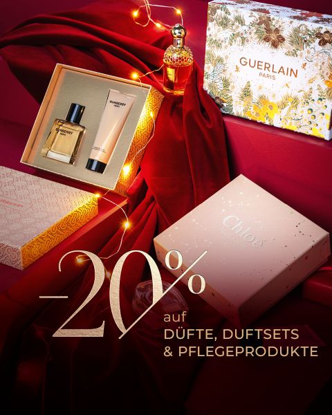 Elegante Parfüm-Geschenksets, festliche Schachteln und Lichterketten auf einem roten Hintergrund. Text: "-20% auf Düfte, Duftsets & Pflegeprodukte.