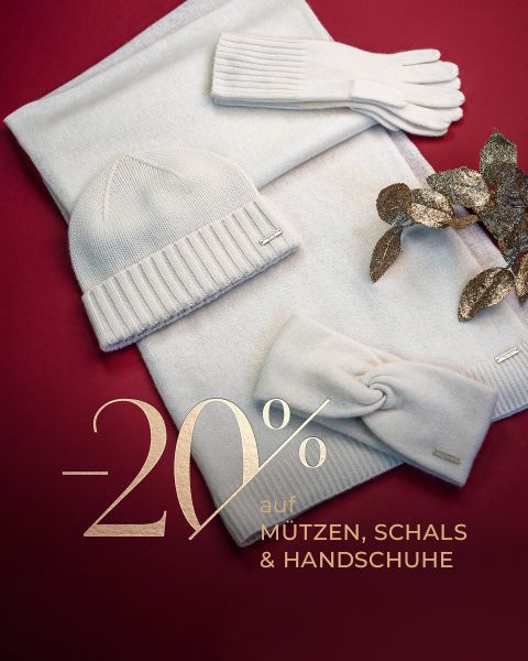 Cremefarbene Winteraccessoires (Mütze, Schal, Handschuhe, Stirnband) auf rotem Hintergrund mit goldenem Text: "-20% auf Mützen, Schals & Handschuhe".