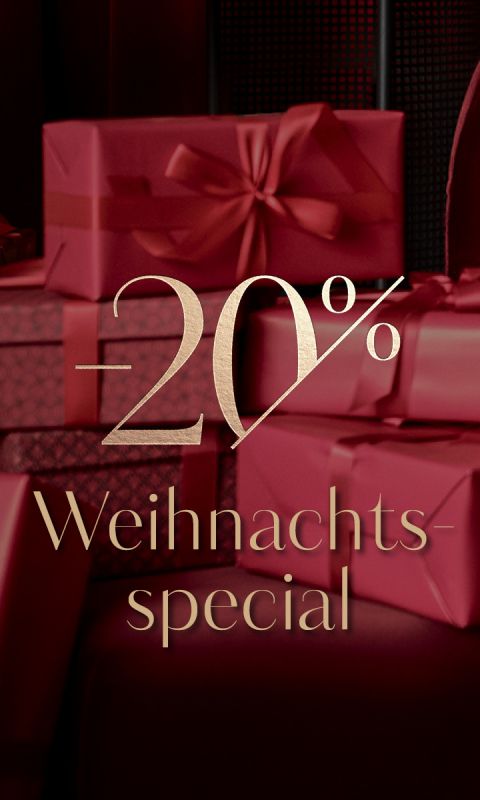 Rote Geschenkschachteln mit Schleifen und goldener Aufschrift "-20% Weihnachts-special" in deutscher Sprache.