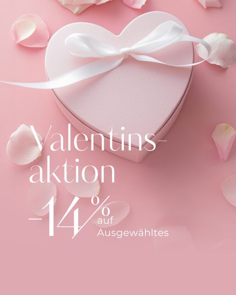Herzförmiger Geschenkkarton mit weißem Band auf rosafarbenem Hintergrund, umgeben von Rosenblättern; deutscher Text bietet 14% Rabatt auf ausgewählte Artikel zum Valentinstag.