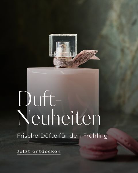 Ein rosafarbener Parfümflakon mit einer Schleife neben rosafarbenen Macarons, mit deutschem Text, der für neue Frühlingsdüfte wirbt.