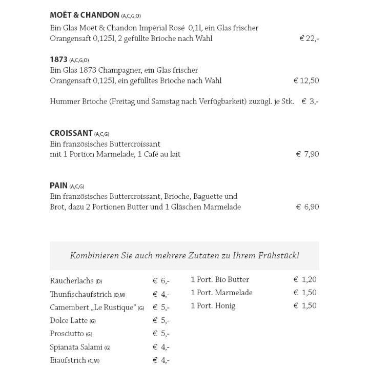 Eine deutsche Frühstückskarte mit Optionen wie Croissants, Brioches, Sekt, Butter, Marmelade, Käse und Baguette mit Preisen in Euro.