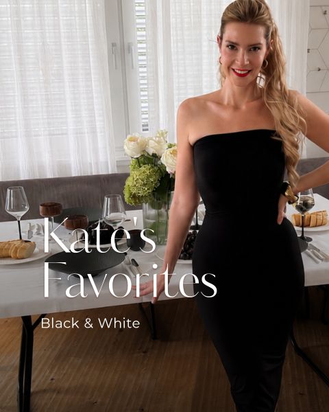 Eine Frau in einem trägerlosen schwarzen Kleid steht neben einem Tisch, auf dem Wein, Kuchen und Blumen stehen. Der Schriftzug lautet: „Kates Favoriten: Schwarz & Weiß“.